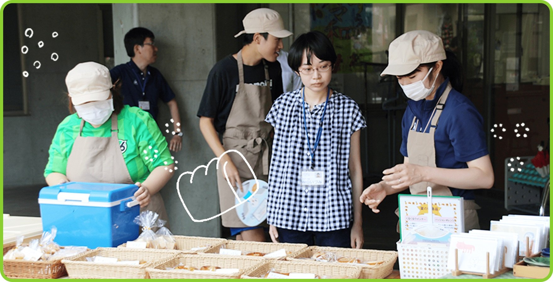 作業の説明を受ける秋山さんの写真
